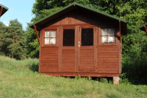 wooden,cabin,or,lodge,as,summerhouse,in,a,forest,with